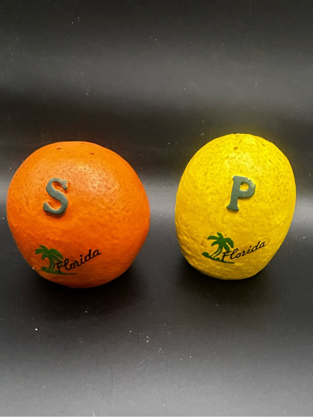 Florida Salt & Pepper shakers w/ Tupperware seals!